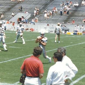 #83 WR Jim Fitzpatrick catching a ball from John Reaves prior to the game against Houston