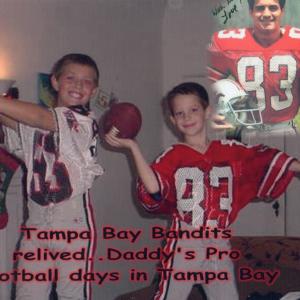 Jim Fitzpatrick's sons JJ & Jadon, wearing Jim's Professional Football uniforms from Tampa Bay, while living in Los Angeles