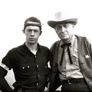 Publicity Photo of Ghost Town in the Sky Theme Park. Paul Fix visits Ghost Town as a celibrity gunfighter in 1962. Pictured with him is 