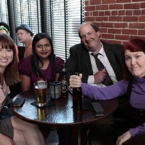 Still of Kelly Erin Kate Flannery Mindy Kaling Brian Baumgartner and Ellie Kemper in The Office 2005