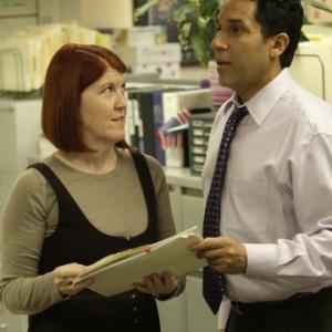 Still of Kate Flannery and Oscar Nuez in The Office 2005