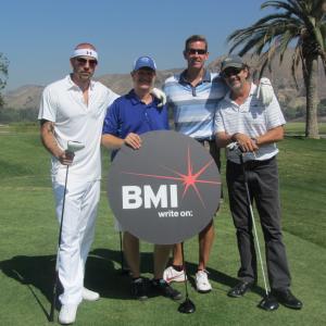 BMIMr Hollands Opus annual golf charity event !st place 11 under par From left Matt Koskenmaki Dave Reynolds Eric Colvin and Claude Foisy