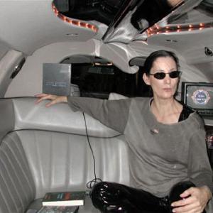 Deborah Smith Ford as Matrixs Trinity lookalike in limo on the way to the Looney Tunes premiere this is her on the Neb look