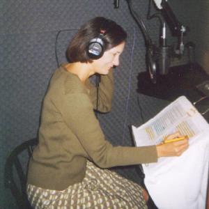 Deborah Smith Ford, as Judith Bunker, reviewing script in recording studio