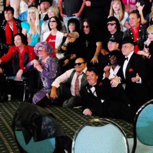 Ford as Sabrina, from Charlie's Angels, in top middle among a fraction of lookalike attendees at Sunburst Convention.