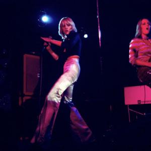 The Runaways (Cherie Currie, Lita Ford) performing at CBGB in New York City on August 2, 1976
