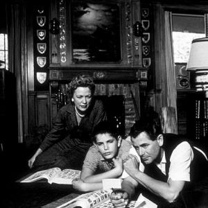 Glenn Ford with his wife and son, Peter, at home, 1958.
