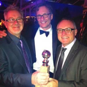 Richard Ford with Jim Burke [producer] and Kevin Tent [film editor]. The Descendants wins Golden Globe best motion picture [drama] 2012