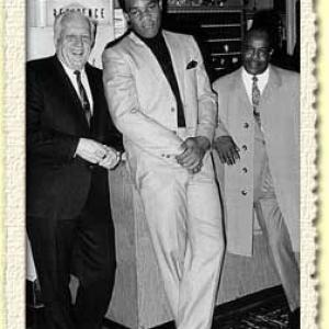 Colonel Barney Oldfield with George Foreman and Charles R Doc Broadus