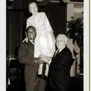 Colonel Barney Oldfield and his wife Vada with George Foreman