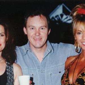 John Fox with Jane Badler left and Judy Green right on the set of Under the Gun 1995