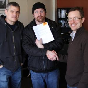 Posing with signed iOPIF paperwork with Oregon Film Office Director Vince Porter.