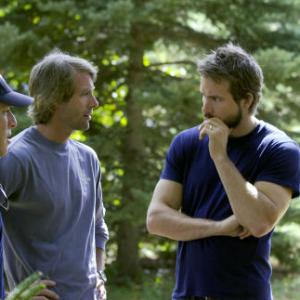 Producer BRAD FULLER, producer MICHAEL BAY, RYAN REYNOLDS, and MELISSA GEORGE on the set of THE AMITYVILLE HORROR.