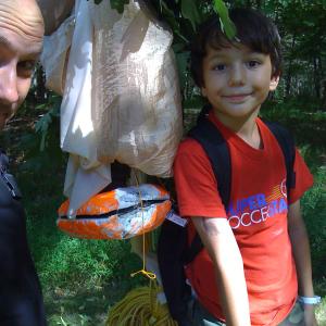 Luke Geissbhler and Max Geissbhler retrieving their homemade spacecraft in the short film Space Balloon