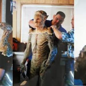 Behind the scenes on Angel. Brett Gilbert sitting four and a half hours for full body demon lizard make up.