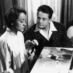 Still of Jean Desailly and Annie Girardot in Maigret tend un piège (1958)