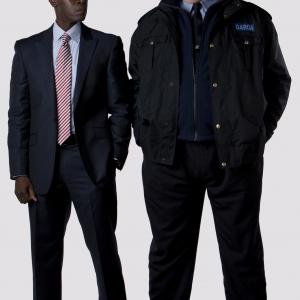 Still of Don Cheadle and Brendan Gleeson in The Guard (2011)
