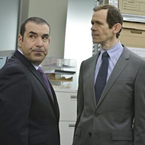 Still of Adam Godley and Rick Hoffman in Suits (2011)