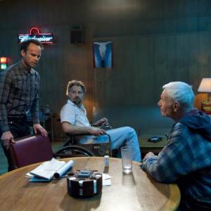Still of Raymond J. Barry and Walton Goggins in Justified (2010)