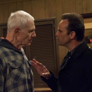 Still of Raymond J. Barry and Walton Goggins in Justified (2010)