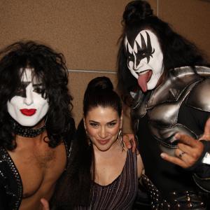 Actress KarenEileen Gordon with bandmembers from Kiss My Ass at the Paparazzi PR Reality Series Launch Party and Concert at Rolling Stone Lounge in Hollywood California