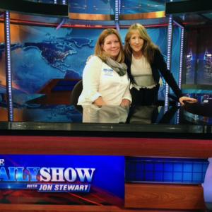 Behind Jon Stewart's historic desk with friend and colleague producer Donna Smealand after participating in 