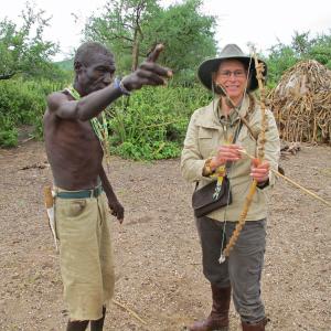 Morongo Tribe elder teaching me bow and arrow Tanzania