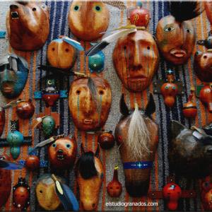 Sampling of mixedmedia masks by Bernie Granados Jr These are constructed of plasterrollgourdspainted with acrylics and decorated with horsehairwood beads antler feathers leather and shells