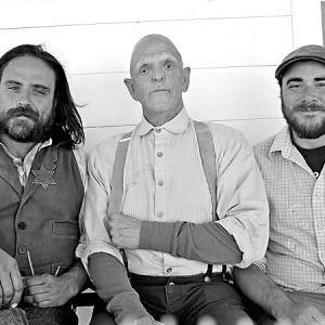 L-R: Co-director Justin Meeks, veteran character actor Michael Berryman (One Flew Over the Cuckoo's Nest, Weird Science, The Hills Have Eyes), and co-director Duane Graves on set of the dark western RED ON YELLA, KILL A FELLA, December, 2012