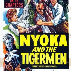 Kay Aldridge Clayton Moore and Lorna Gray in Perils of Nyoka 1942