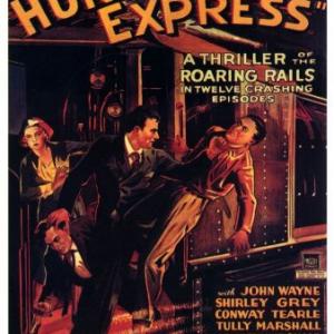 John Wayne and Shirley Grey in The Hurricane Express 1932