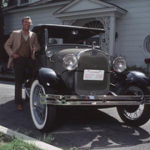Andy Griffith and his 1938 Ford Phaeton at his Toluca Lake Home in CA. 1979