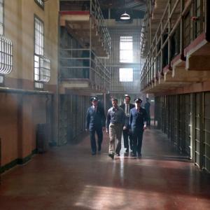 Jeffrey Pierce and Jason Butler Harner walking towards cellblock D - Built on stage in Vancouver for 