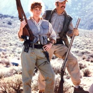 Reba McEntire and Michael Gross as Burt and Heather Gummer in TREMORS
