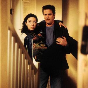 Still of Paul Gross and Molly Parker in Men with Brooms 2002