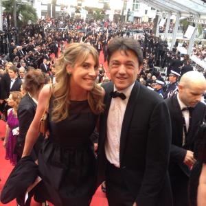 Emma Gattuso and Stephane Guenin walking the red carpet for the FIF Cannes 2015 award ceremony