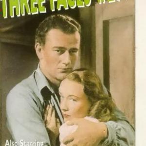 John Wayne and Sigrid Gurie in Three Faces West 1940
