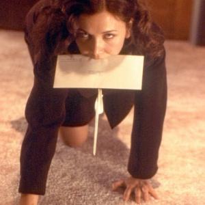 Still of Maggie Gyllenhaal in Secretary (2002)