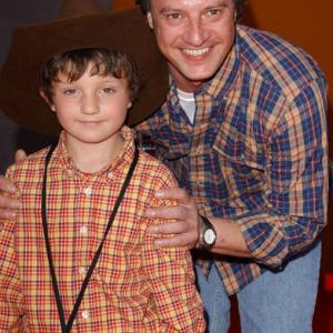 Edd Hall with his son Sam at the world movie premiere of Home on the Range in Hollywood
