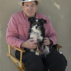 Daisy the Wonder Dog and trainerwrangler Tim Halpin on the set of OBSTRUCTION