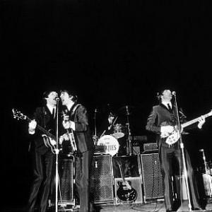 The Beatles Paul McCartney George Harrison Ringo Starr John Lennon in performance c 1964