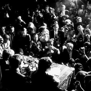 The Beatles (Ringo Starr, John Lennon, George Harrison, & Paul McCartney) at a press conference. 1964