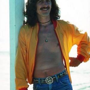 George Harrison in Acapulco sporting blue jeans and a windbreaker January 1977