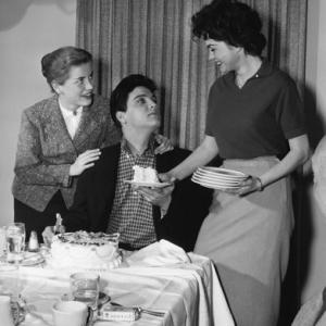 Elvis Presley with Dolores Hart and Valerie Allen at an Army Bond farewell party given by Hal Wallis during the making of King Creole 03121958