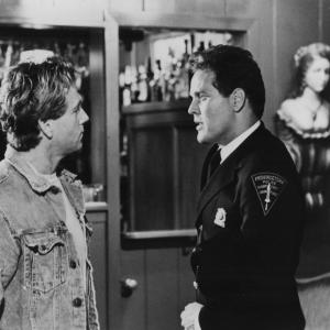 Still of Wings Hauser and Ryan O'Neal in Tough Guys Don't Dance (1987)