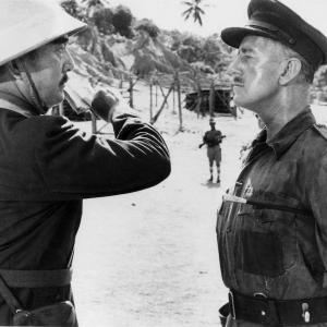Still of Alec Guinness and Sessue Hayakawa in The Bridge on the River Kwai (1957)