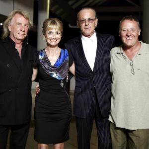 With Francis Rossi and Rick Parfitt as they leave the party