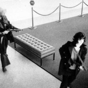 Donald DeFreeze and Patty Hearst leaving the Hibernia Bank in San Francisco April 15 1974