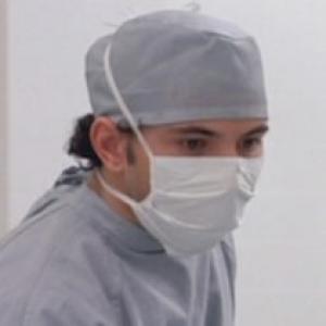 Kyle T. Heffner as Dr. Charles Litto in Young Doctors In Love