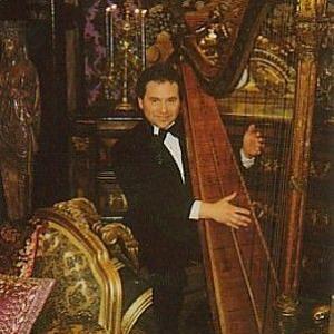 Harrison Held on the set of That 70s Show playing the harpist in Jackies fantasy